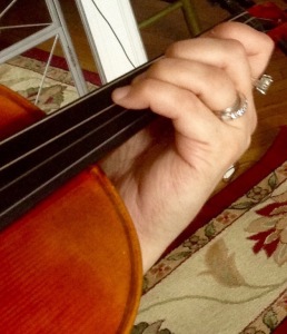 When practicing the Fwapping player can begin with totally straight fingers, allowing fingers to drop from knuckle then quickly raise them off string as if fingerboard was burning hot. Then the study can be modified with fingers slightly curled, more closely resembling how one would normally play. 